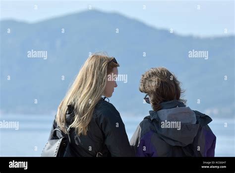 Two Women Standing Next To Each Other Hi Res Stock Photography And
