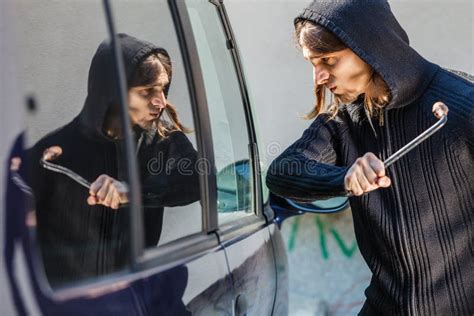 Thief Burglar Breaking Smashing The Car Window Stock Image Image Of