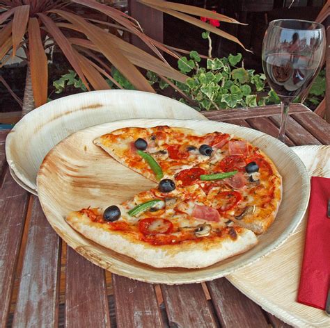 Could this be trader joe's next big product? Nothing beats a proper wood fired pizza served on a palm ...