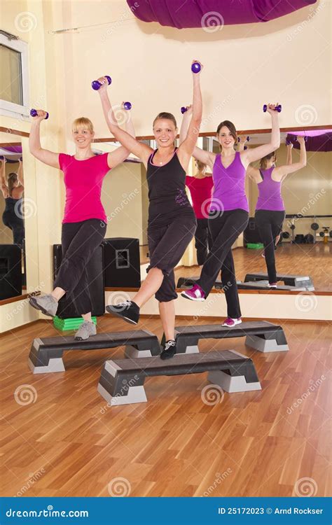 Young Women Exercising Aerobics In Gym Stock Image Image Of Conscious