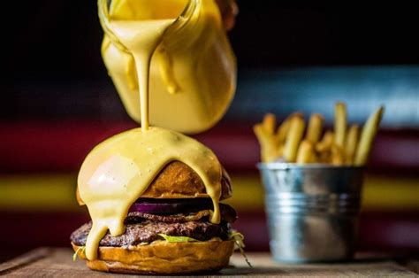 London Restaurant Maxwells Is Serving Burgers Covered In Melted Cheese