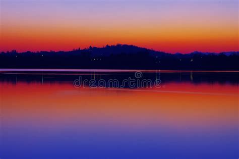 Reflections Of The Lake At Sunset Stock Photo Image Of Mirror Varese