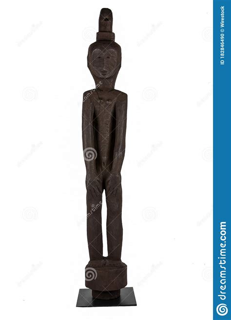 Closeup Shot Of A Wooden Statue Of A Man Isolated On A White Background