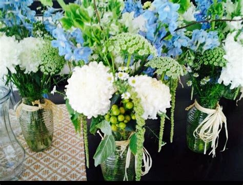 Christmas flowers & greenery ideas. Boy Baby Shower Floral Arrangement | Baby shower flowers ...