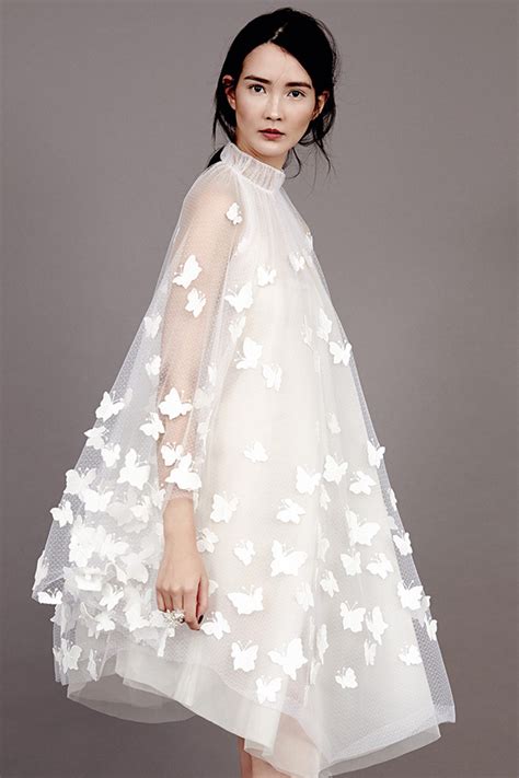 A Statement Trend 19 Amazing Wedding Dresses With Capes