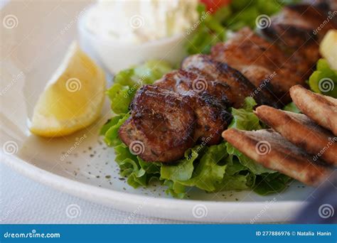 Souvlaki Meat Skewers Traditional Greek Meat Food On Pita Bread