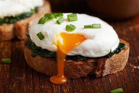 Poached Eggs With Wilted Spinach On Toast