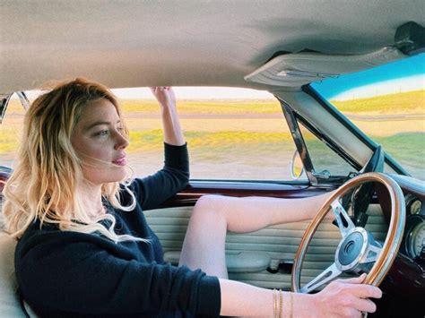 Amber Heard Makes Facial Expressions In Her Car Demotix