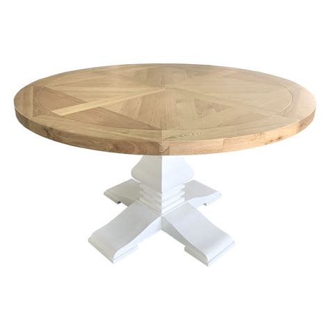 Available in a range of sizes, our kitchen and dining room tables can seat as few or as many as you like—from the cozy table tucked in the corner of your kitchen to the extension table with leaf that easily seats up to ten guests. Newport Round Dining Table - JAC Home Living