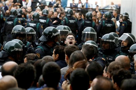 Catalan Referendum Pro Independence Groups Call For General Strike After Police Crackdown