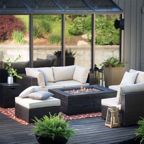 The best fire pit table set for you in 2021 4. Belham Living Marcella Wicker Sectional with Bozeman Fire ...