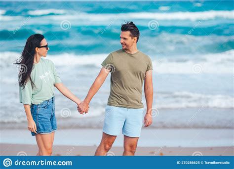 Young Couple In Love On The Beach Summer Vacation Happy Man And Woman