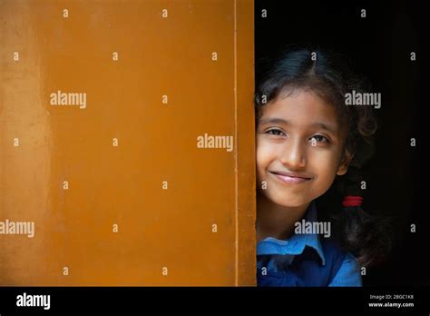 School Girl Standing At Door Stock Photo Alamy