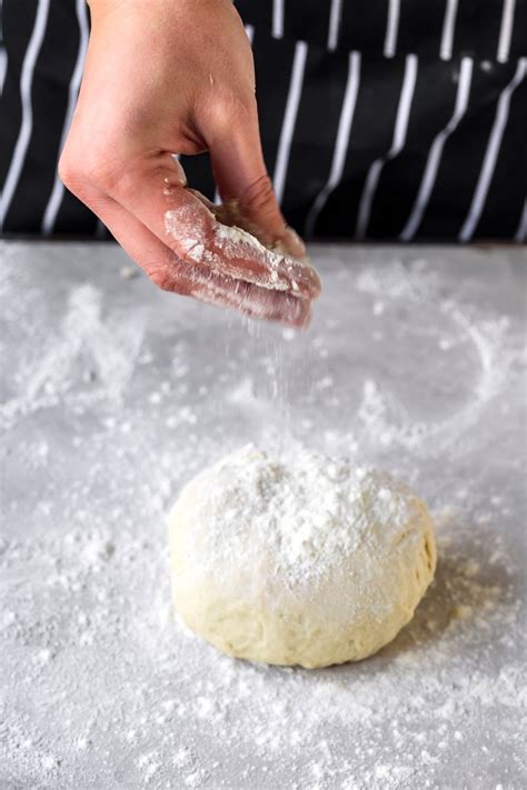 Bake the pizza on the stone in the preheated oven until the bottom of the crust is browned, 6 to 8 minutes. Classic New York-Style Pizza Dough Recipe