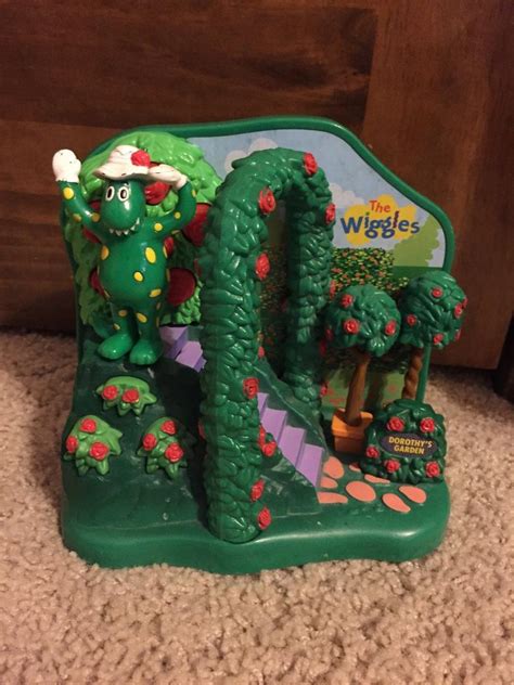The Wiggles Dorothy The Dinosaur Figure And Dorothys Garden Playset