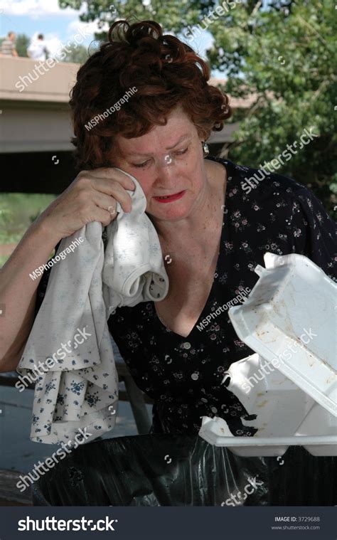 Old Homeless Woman Going Through Trash Stock Photo 3729688 Shutterstock
