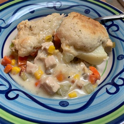 A Blue And White Plate Topped With Chicken Pot Pie