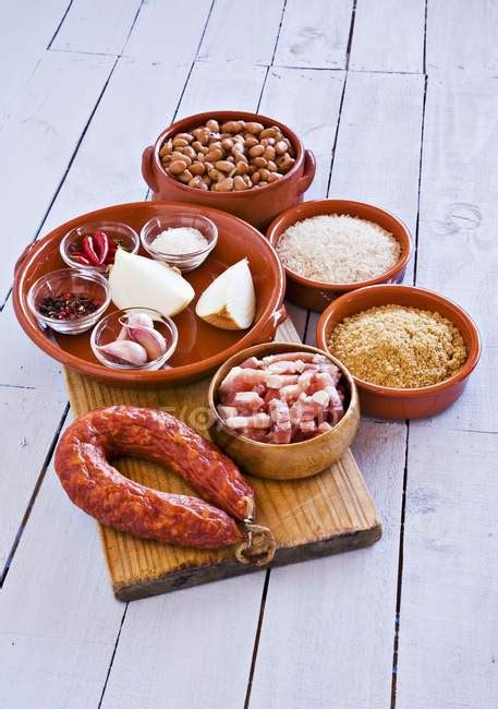 Foods Of Spanish Cuisine — Staple Food Chorizo Stock Photo 153743632