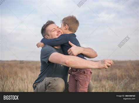 Happy Son Hugging Dad Image And Photo Free Trial Bigstock