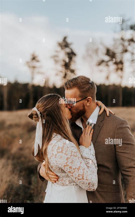 Bride And Groom Kissing Stock Photo Alamy