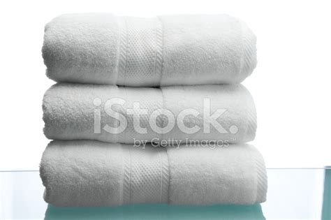 Fluffy White Towels On Reflective Surface Stock Photo Royalty Free