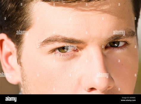Close Up On Staring Man Green Eyes Stock Photo Alamy