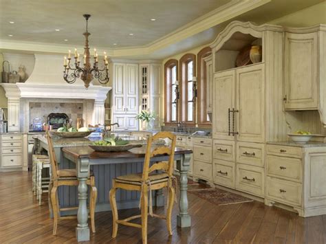 French Country Kitchen With Distressed Cabinets And Blue