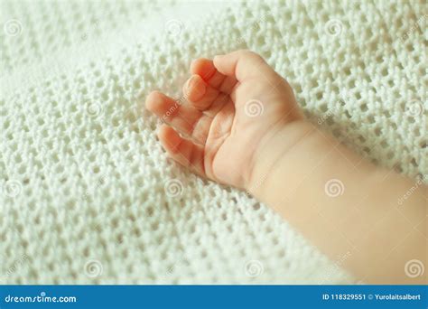 Hand Of A Newborn Baby On A White Blanket Stock Image Image Of Face