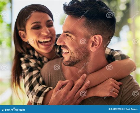 Love Is Bliss Shot Of An Affectionate Young Couple Bonding At Home Stock Image Image Of