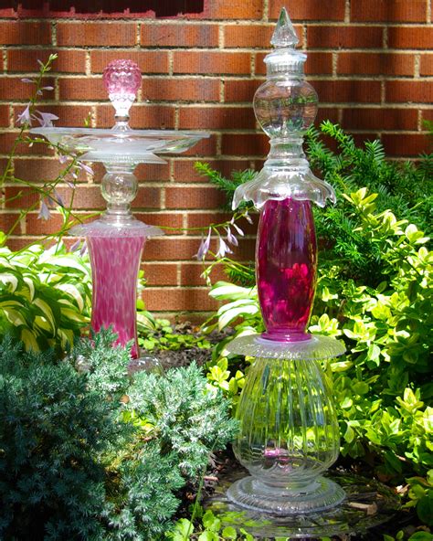 Glass Garden Sculptures In The Garden Garden Art Diy Glass Garden Art Glass Bottle Diy Projects