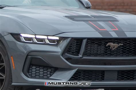 Red And Black Stripes Spied On Carbonized Gray 2024 Mustang Gt Wbronze