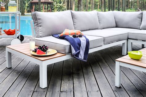 Create the perfect outdoor seating area with our comfortable outdoor sectionals, weather resistant and budget friendly. Havanna Plank Style Outdoor Sectional Sofa in White & Grey with Accent Table