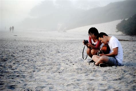 Fotos gratis hombre playa mar arena Oceano mujer cámara