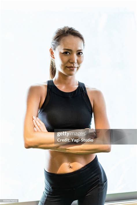 Mid Adult Women Working Out At At Cross Gym High Res Stock Photo