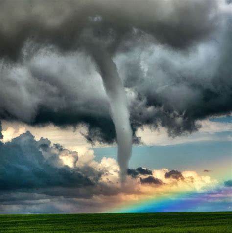 Beautiful Rainbow And Destructive Tornado Seen In Same Image After
