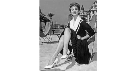 The Gorgeous Sophia Loren Posed Seductively On The Beach In