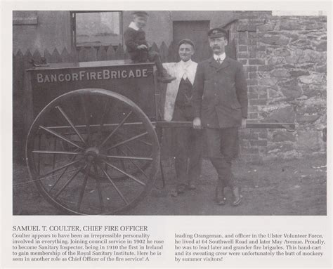 an old photo of two men standing next to a fire hydrant with the