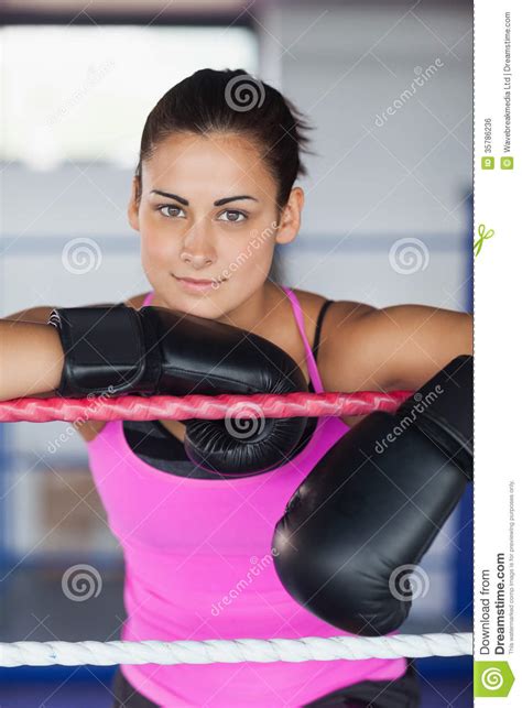 Portrait Of A Beautiful Woman In Black Boxing Gloves Stock Photo