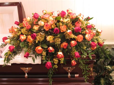 Pink funeral caskets sellers on the site have a proven track record of delivering the utmost. Casket spray of 100 mixed roses in red and two varieties ...