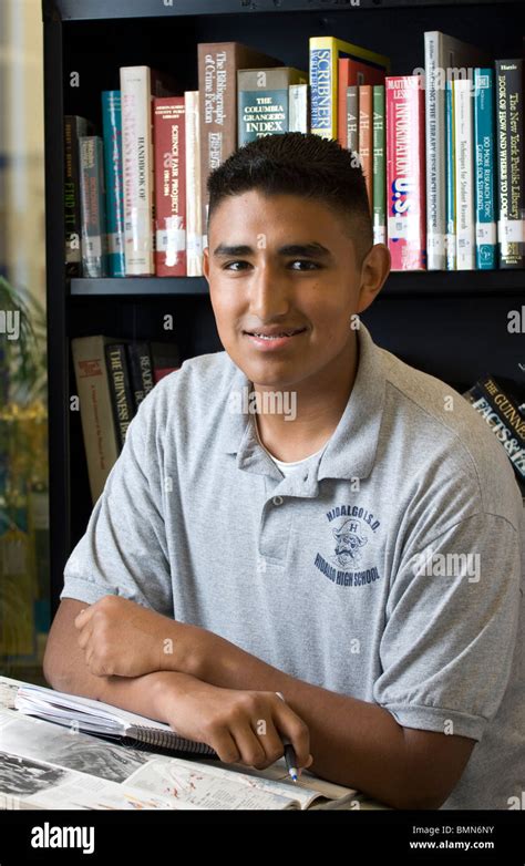 Hispanic Male Student In The Library At Hidalgo Early College High