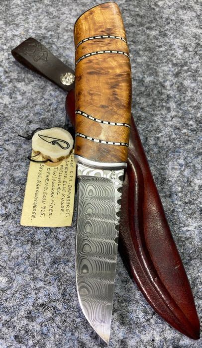 Such knives are often made with great care and have handles made from different varieties of wood which feel very comfortable for holding in hand. Denmark - Excellent Custom Hand Made Hunting Knife ...