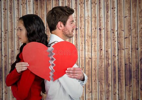 Depressed Couple Holding Broken Heart Stock Photo Image Of Couple