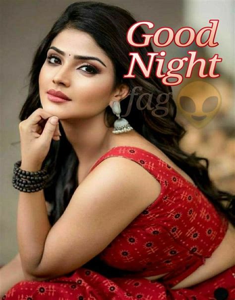 A Woman In Red Dress Sitting Down With Her Hand On Her Chin And The Words Good Night