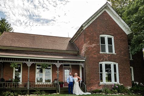 Bride And Groom In Front Of The Historic Building At Four Corners