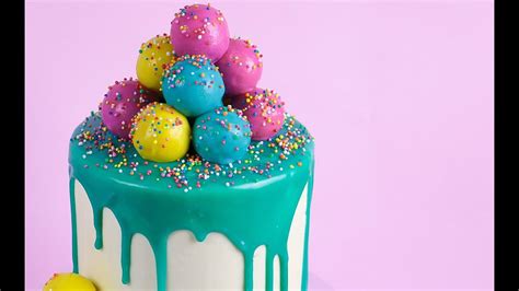 Watch our video on how to decorate a cake for more piping techniques Ganache Dripping, Cake Pop Decorated Cake Tutorial- Rosie ...
