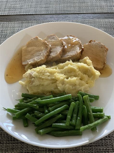 Served it with mashed potatoes , brussel. Pork tenderloin with Mashed Potatoes and Gravy. All in one ...