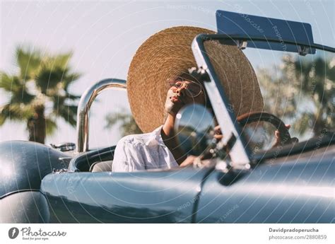 Black Woman Driving A Vintage Convertible Car A Royalty Free Stock