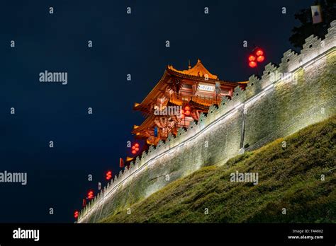 Night View Of The Zhaoqing Ancient City Wall With Pi Yun Lou Building