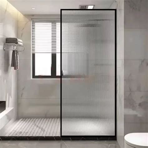 fluted glass shower panel in matt black