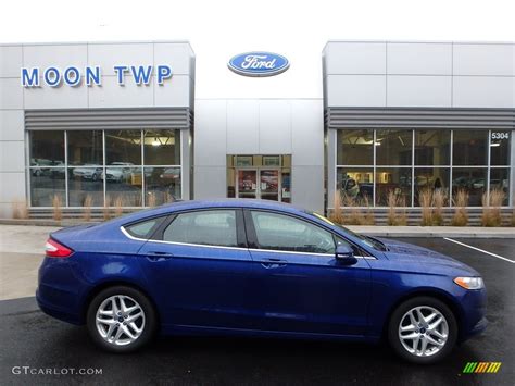 2015 Deep Impact Blue Metallic Ford Fusion Se 123898718